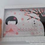 Enfeite porta maternidade com Kokeshi e mais
